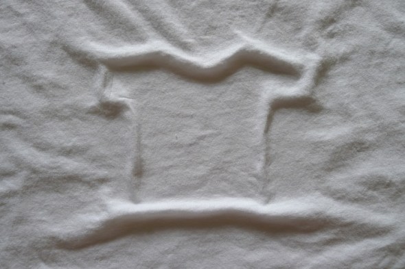 wrinkly white t-shirt